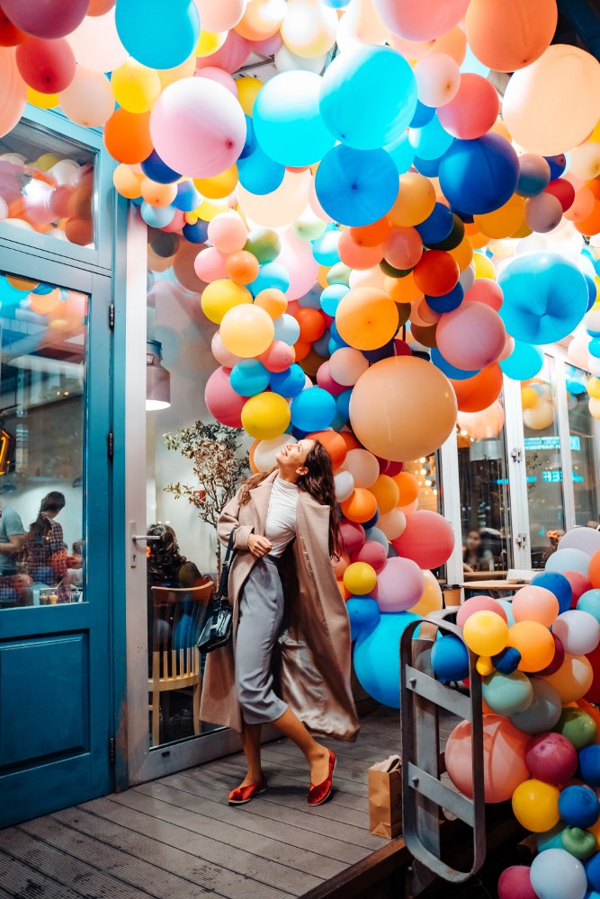 woman-with-colorful-balloons